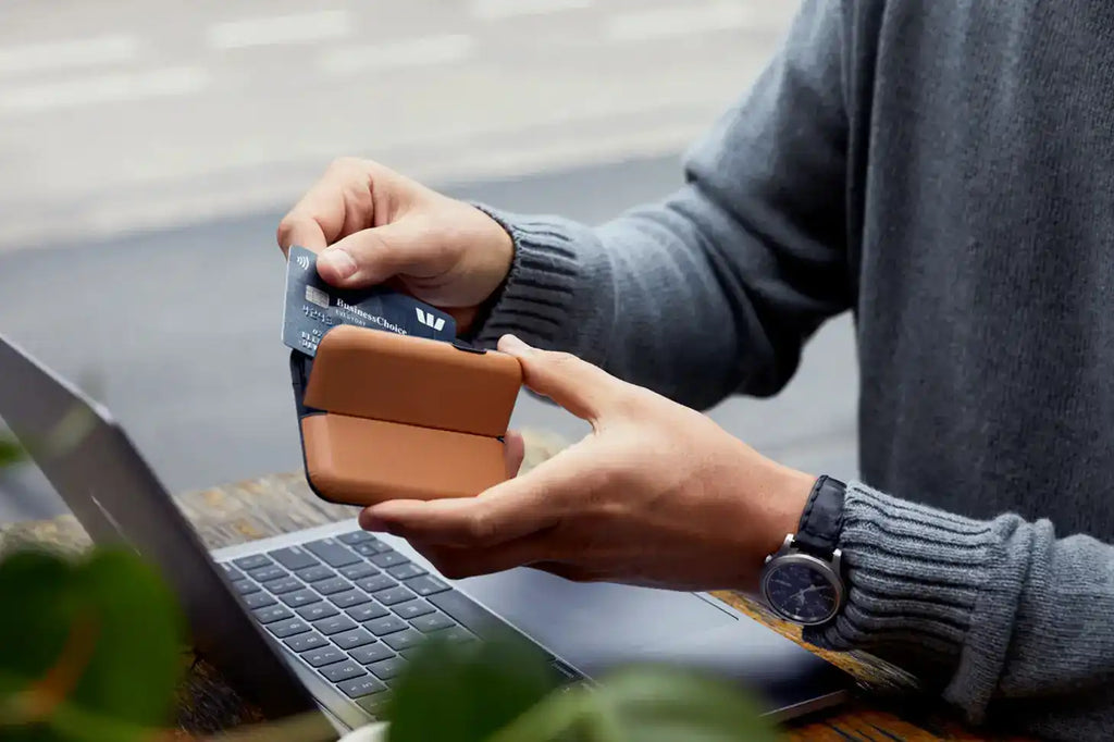 Brown leather card holder.